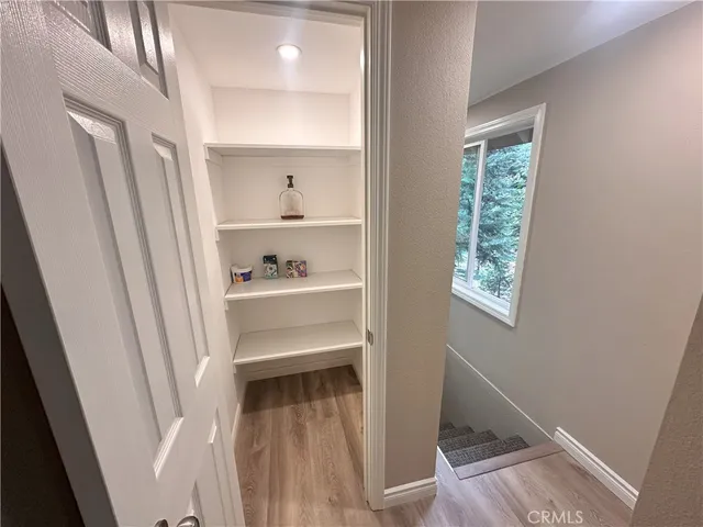 a view of bedroom with a bed and a window