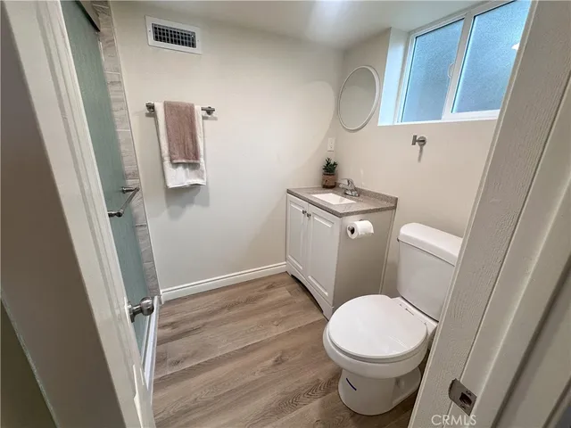 a bathroom with a toilet and a sink