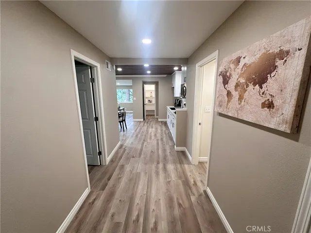 a view of entryway with wooden floor