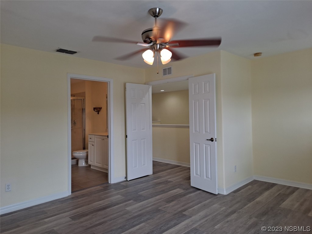 334 Airport Road New Smyrna Beach, FL 32168 - Photo 15 of 33 a view of a livingroom with wooden floor