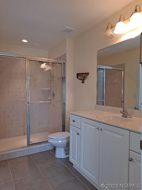 334 Airport Road New Smyrna Beach, FL 32168 - Photo 18 of 33 a spacious bathroom with a shower toilet sink and mirror