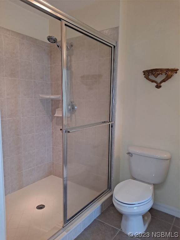 334 Airport Road New Smyrna Beach, FL 32168 - Photo 19 of 33 a bathroom with a shower and a toilet