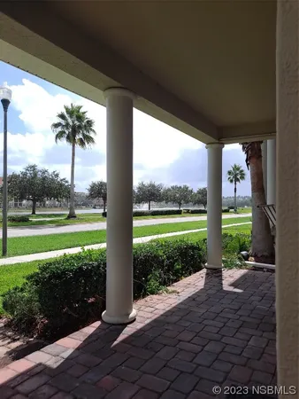 a view of a porch with a yard