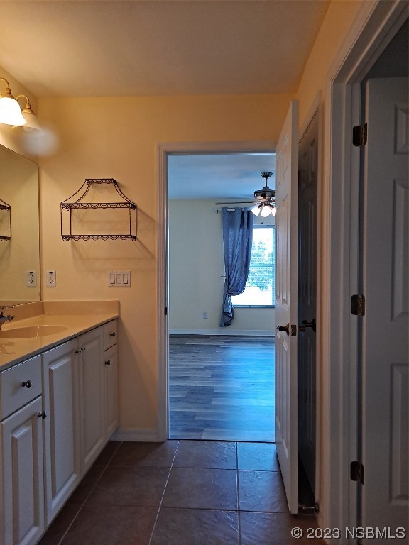 334 Airport Road New Smyrna Beach, FL 32168 - Photo 21 of 33 a view of a bathroom with mirror and bathtub