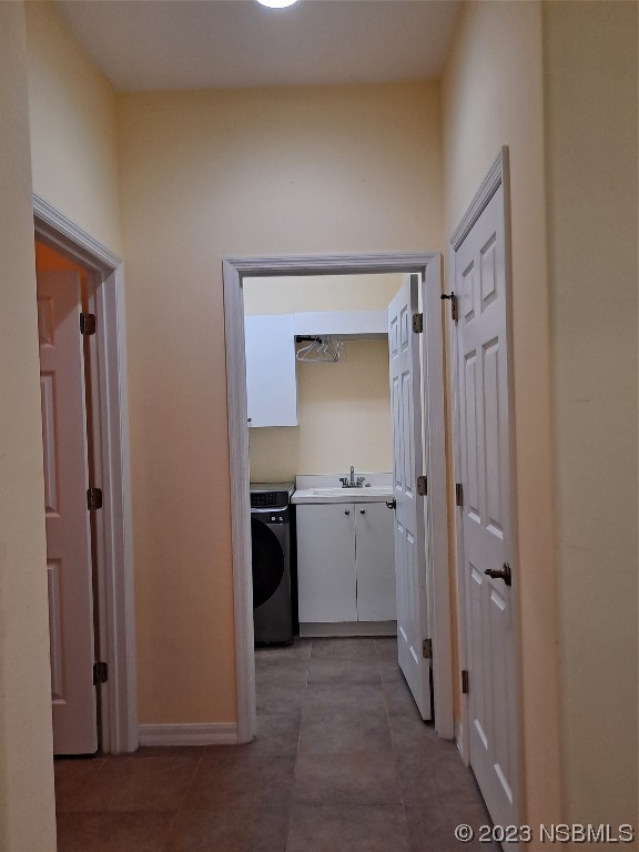 334 Airport Road New Smyrna Beach, FL 32168 - Photo 30 of 33 a view of a kitchen from the hallway
