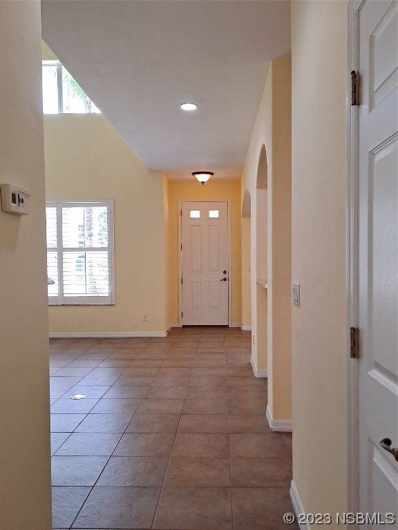 334 Airport Road New Smyrna Beach, FL 32168 - Photo 9 of 33 a view of a hallway with a bathroom