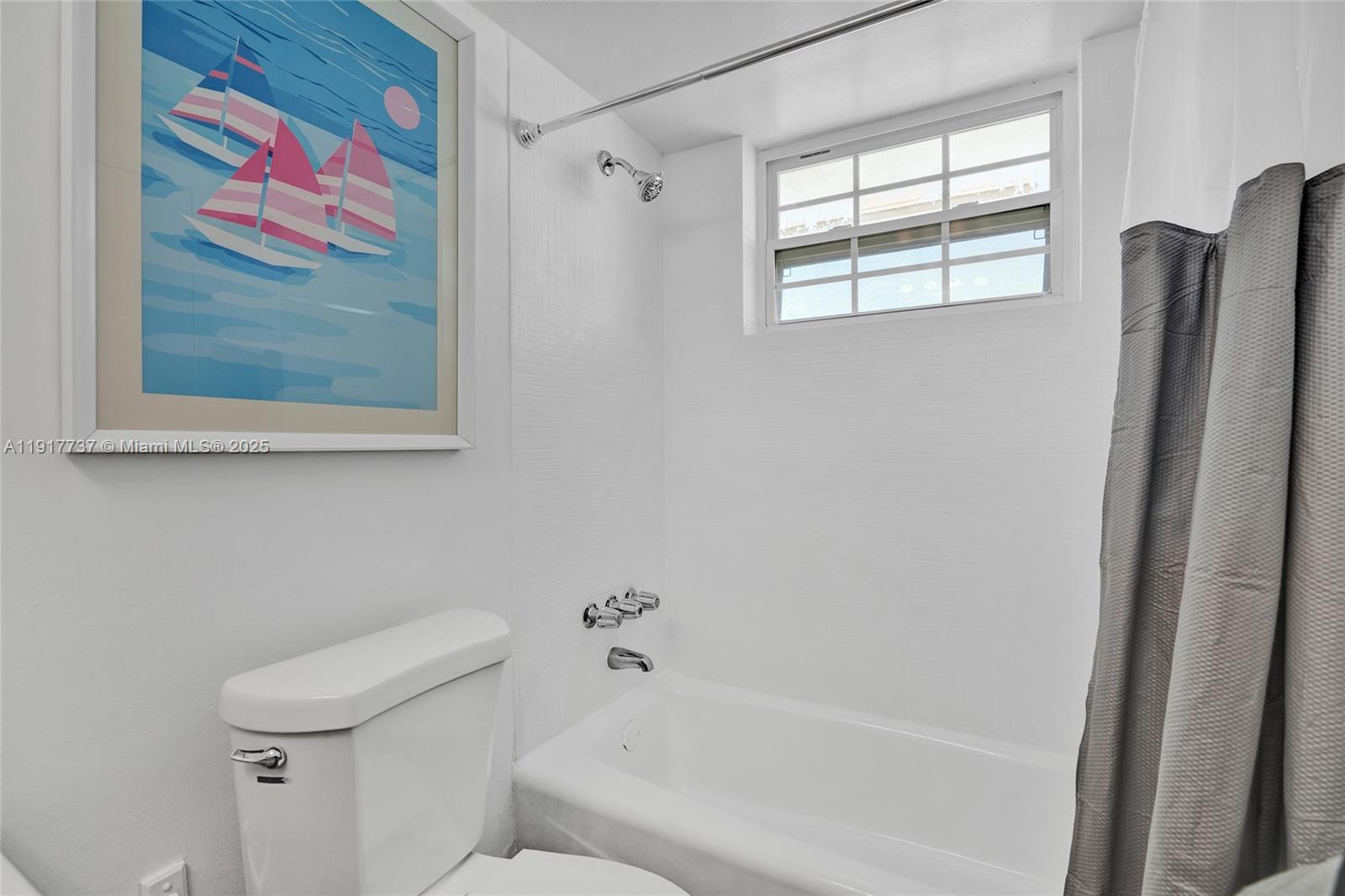 8000 Harding Avenue, Unit 7F Miami Beach, FL 33141 - Photo 19 of 46 a bathroom with a shower and a toilet