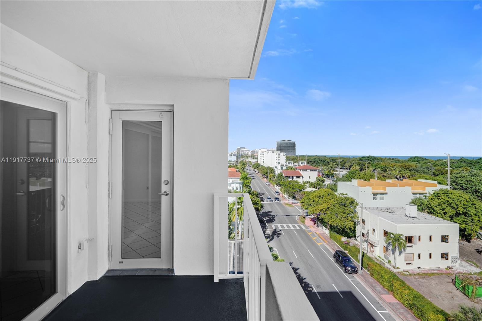 8000 Harding Avenue, Unit 7F Miami Beach, FL 33141 - Photo 20 of 46 a view of a balcony with an ocean view