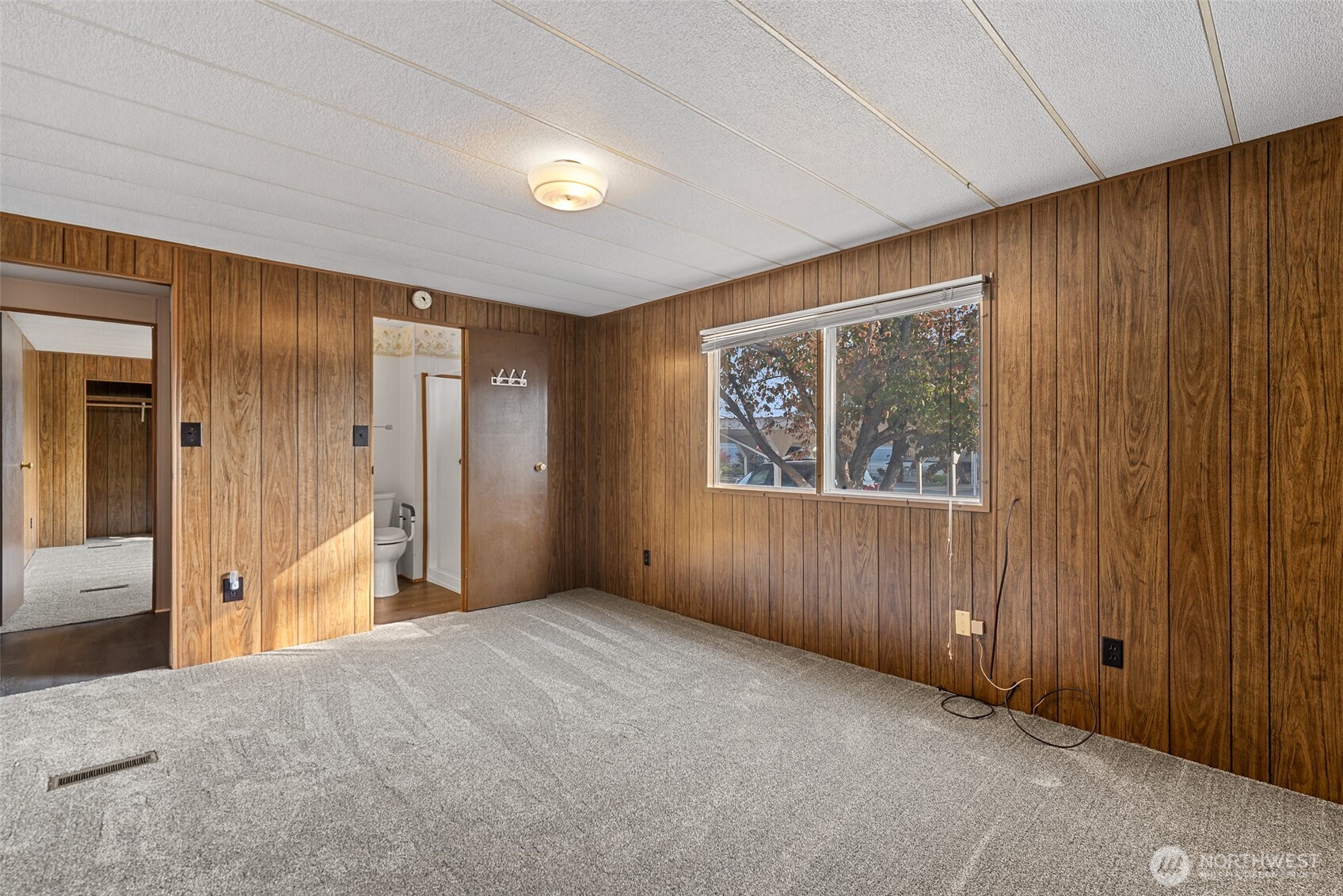1608 North Western Avenue, Unit 3 Wenatchee, WA 98801 - Photo 17 of 26 a view of an empty room with a window