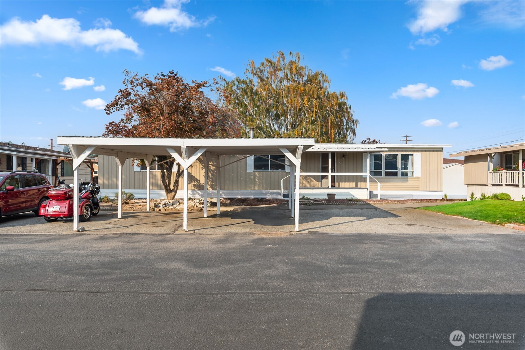 1608 North Western Avenue, Unit 3 Wenatchee, WA 98801 - Photo 2 of 26 a view of a house with a patio and a yard