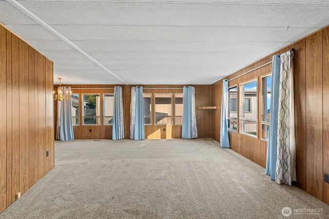 a big room with large windows