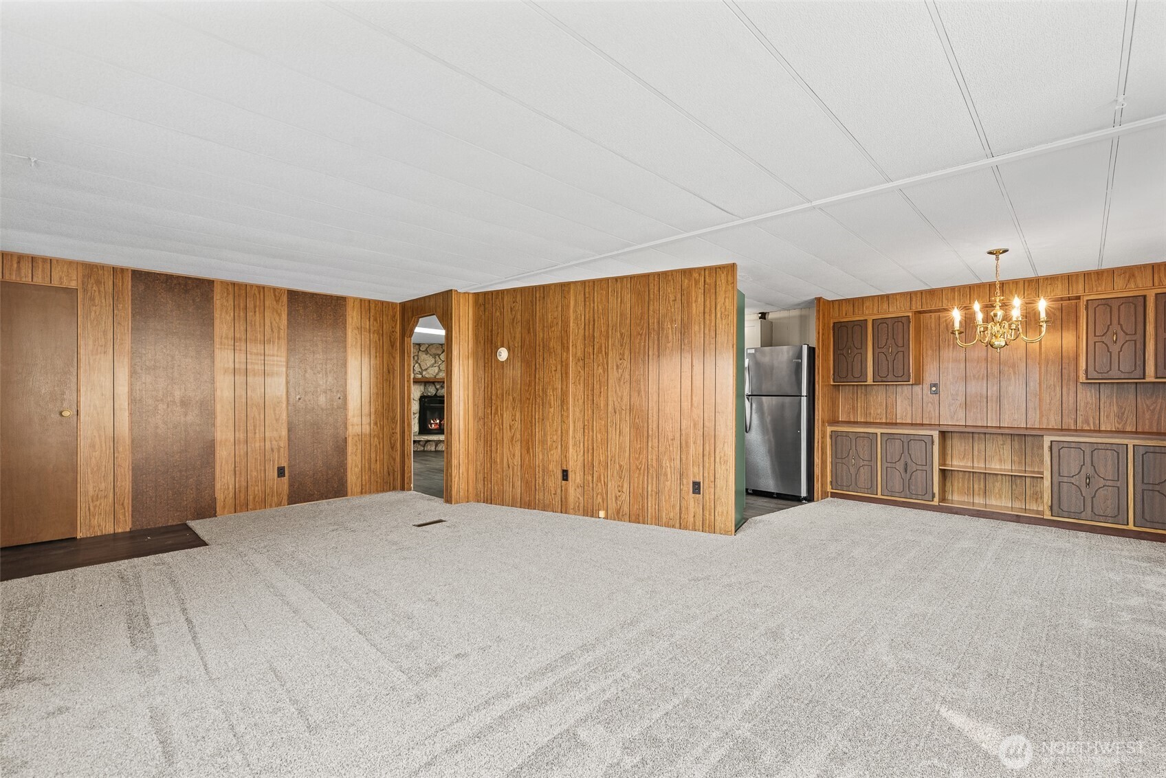1608 North Western Avenue, Unit 3 Wenatchee, WA 98801 - Photo 4 of 26 a view of an empty room with glass door