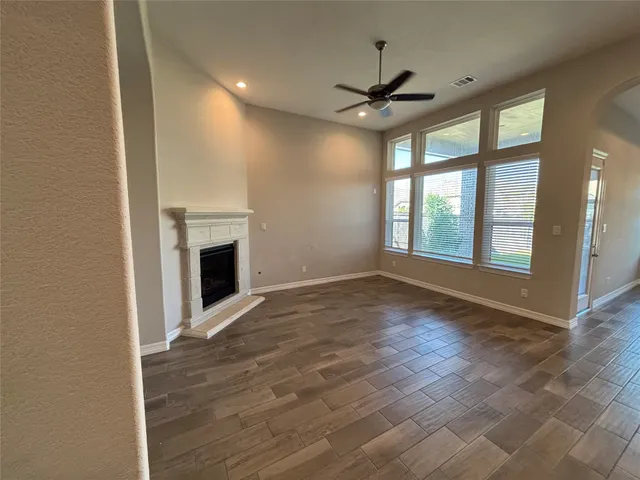 a living room with a fireplace