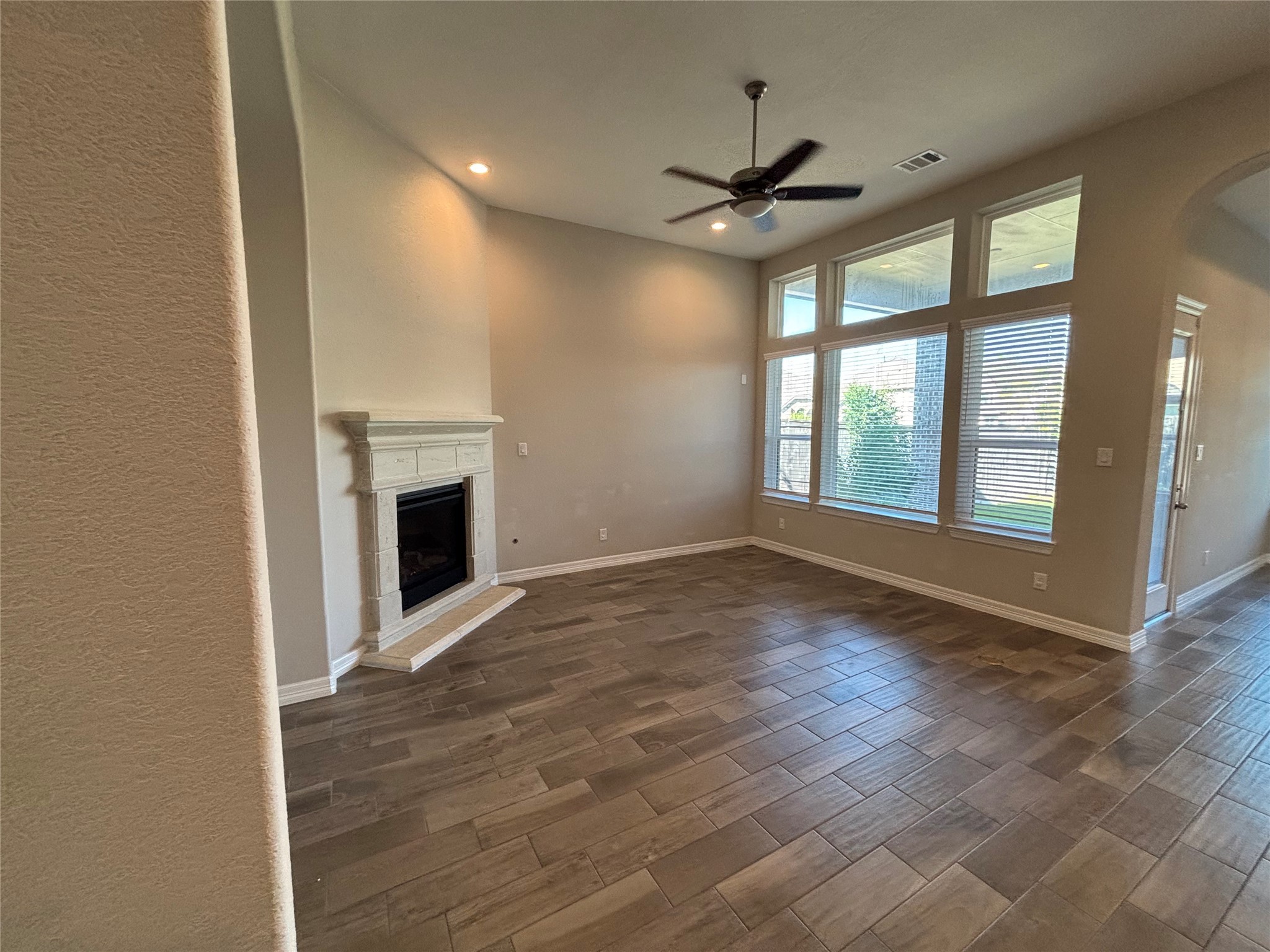 20826 Stonebreak Lane Spring, TX 77379 - Photo 16 of 37 a view of empty room with wooden floor and fireplace