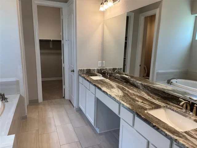 a view of a house with a yard porch and sitting area