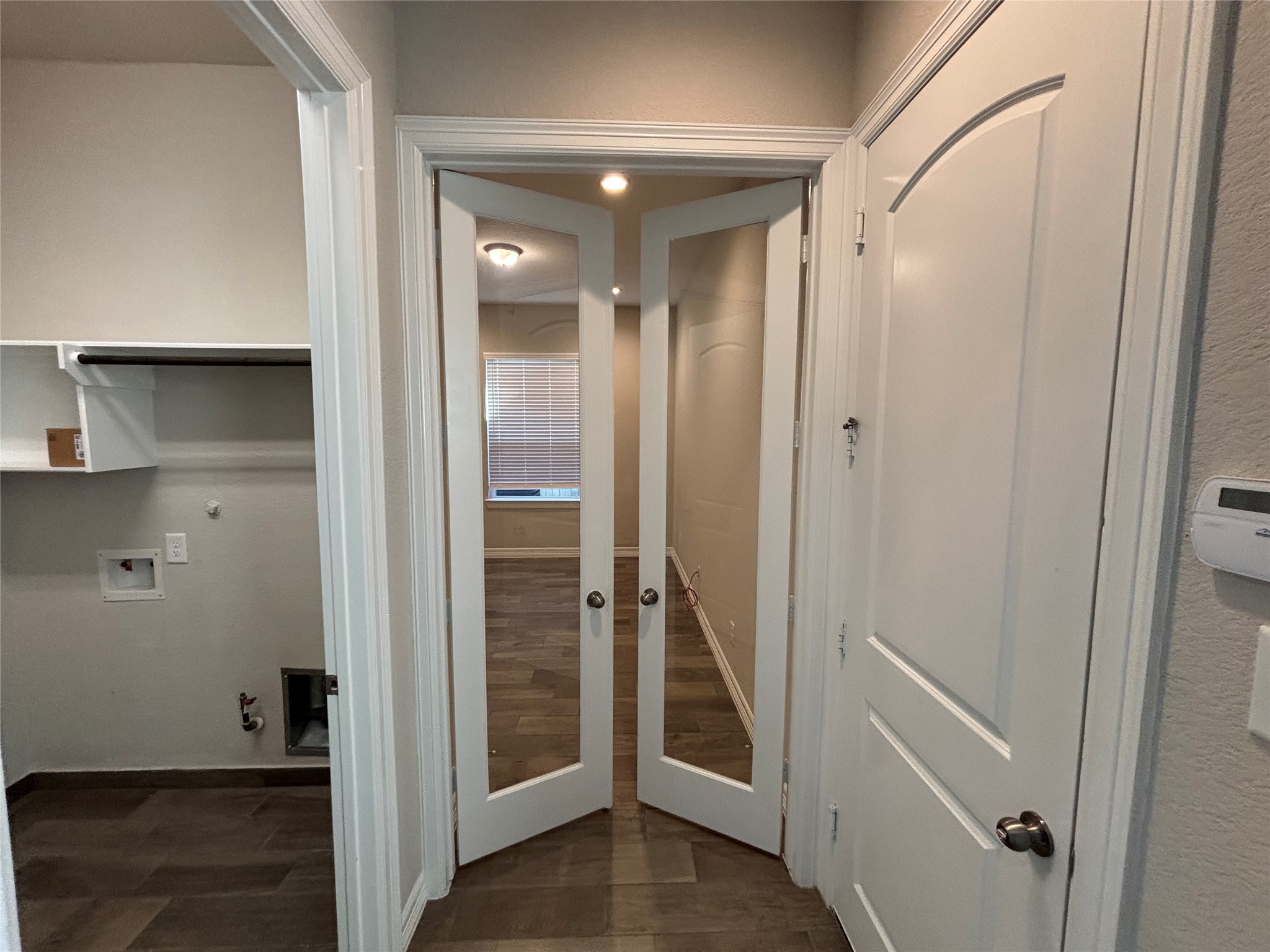 20826 Stonebreak Lane Spring, TX 77379 - Photo 8 of 37 a view of a hallway with wooden floor and closet