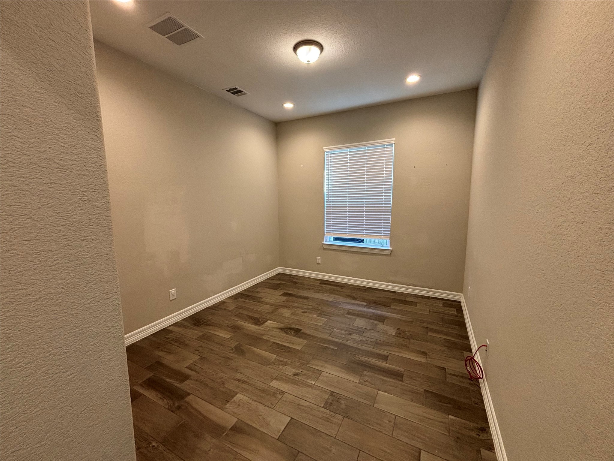 20826 Stonebreak Lane Spring, TX 77379 - Photo 9 of 37 an empty room with windows