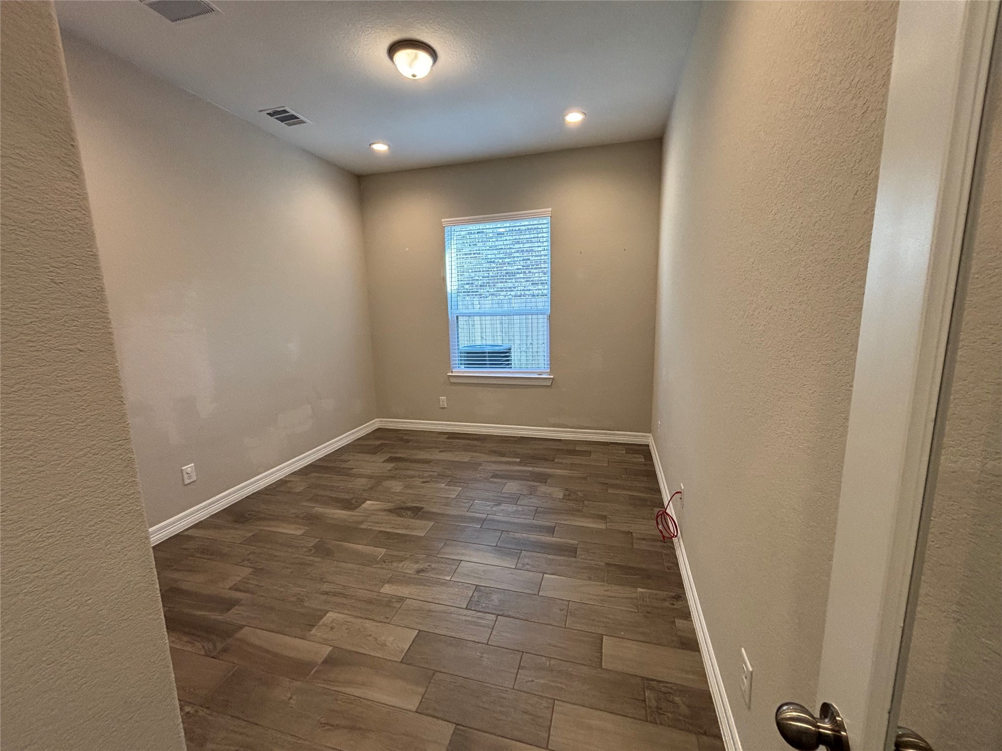20826 Stonebreak Lane Spring, TX 77379 - Photo 10 of 37 a view of an empty room and window