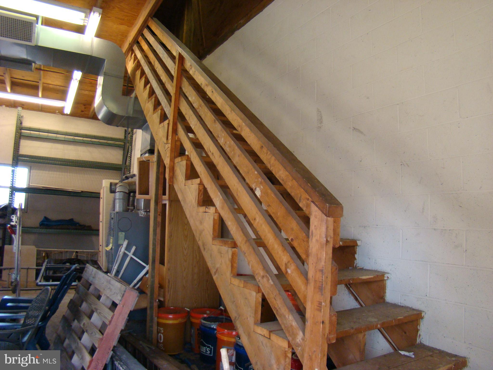 10928 Riverview Road Fort Washington, MD 20744 - Photo 40 of 45 Stairs to upper garage storage area