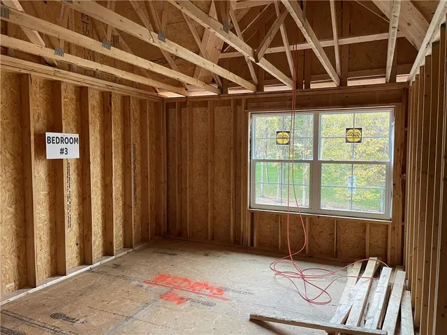 a view of entryway with a front door