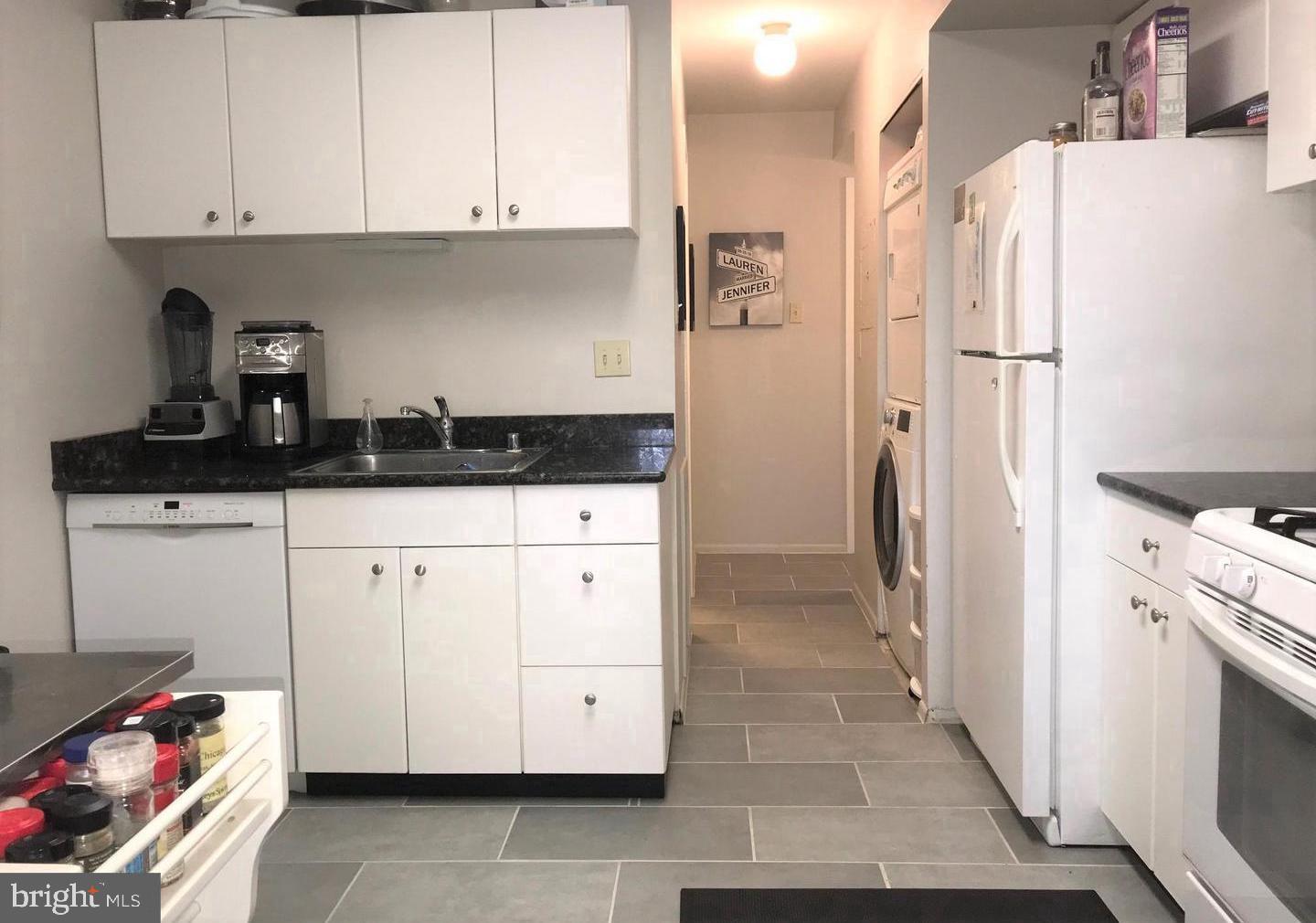 2068 Royal Fern Court, Unit 12B Reston, VA 20191 - Photo 2 of 9 Kitchen and Laundry