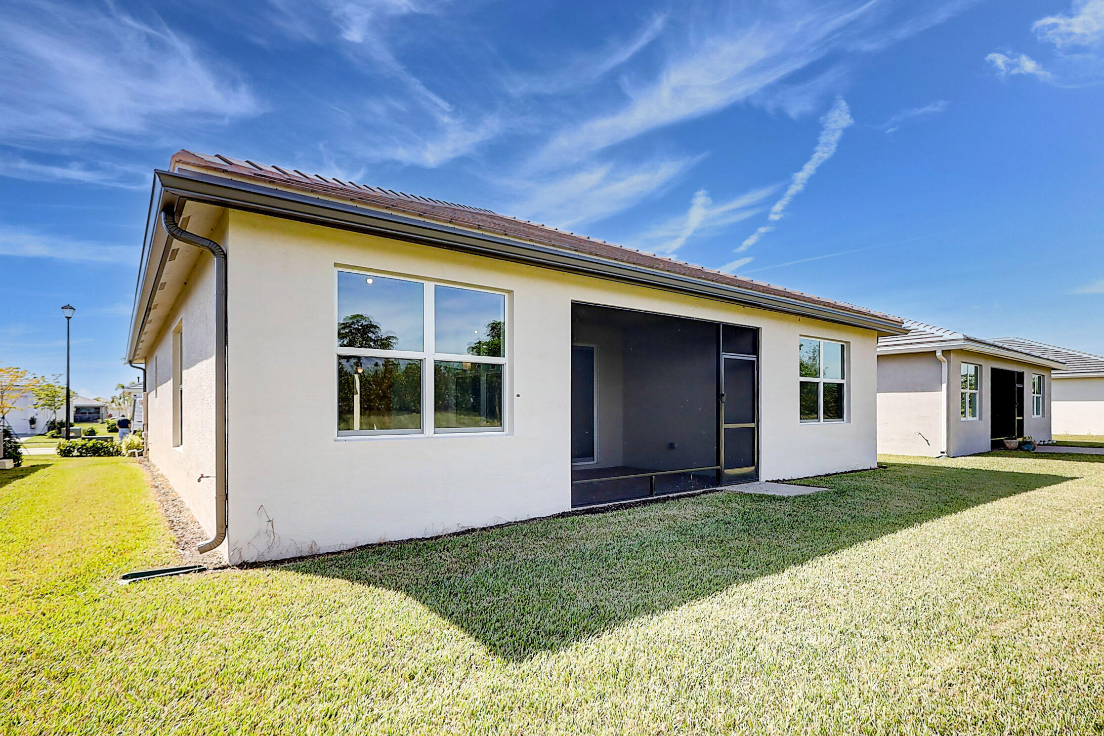 13549 Southwest Oceanus Boulevard Port St. Lucie, FL 34987 - Photo 30 of 30 a front view of house with yard