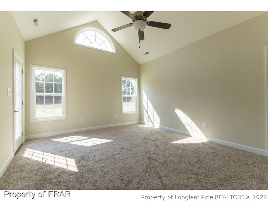 5615 Wade-Stedman Road Wade, NC 28395 - Photo 20 of 36 a view of empty room with windows