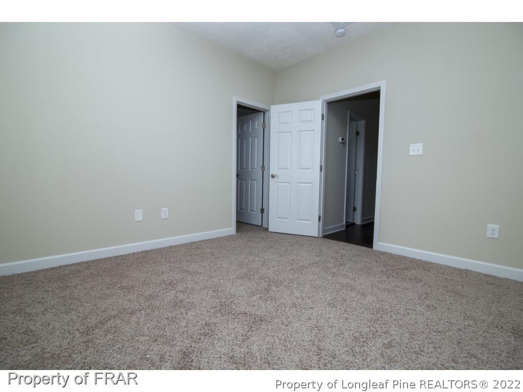 5615 Wade-Stedman Road Wade, NC 28395 - Photo 22 of 36 a view of an empty room