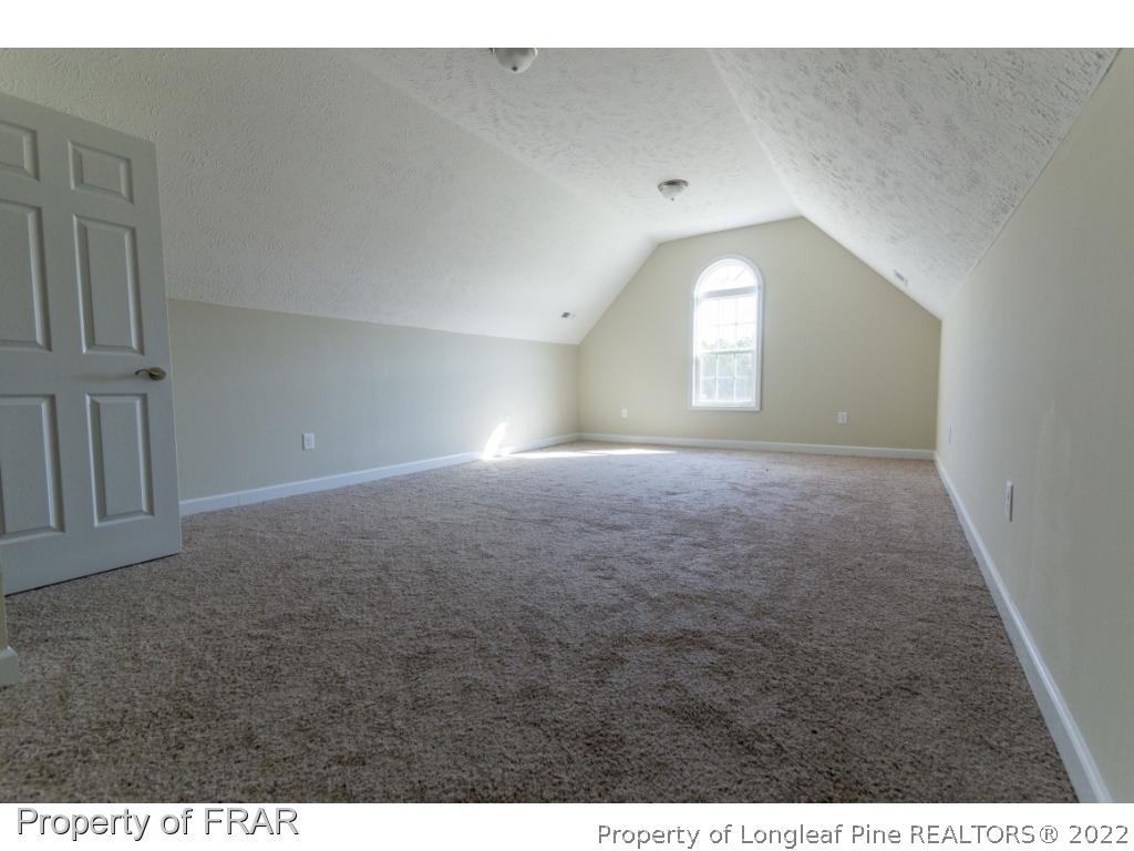 5615 Wade-Stedman Road Wade, NC 28395 - Photo 27 of 36 a view of empty room with window