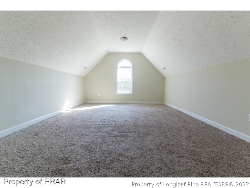 5615 Wade-Stedman Road Wade, NC 28395 - Photo 28 of 36 a view of empty room with window