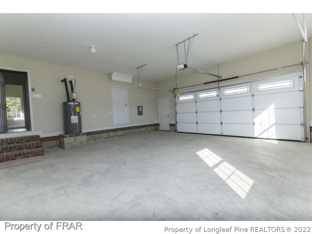 5615 Wade-Stedman Road Wade, NC 28395 - Photo 29 of 36 a view of a garage