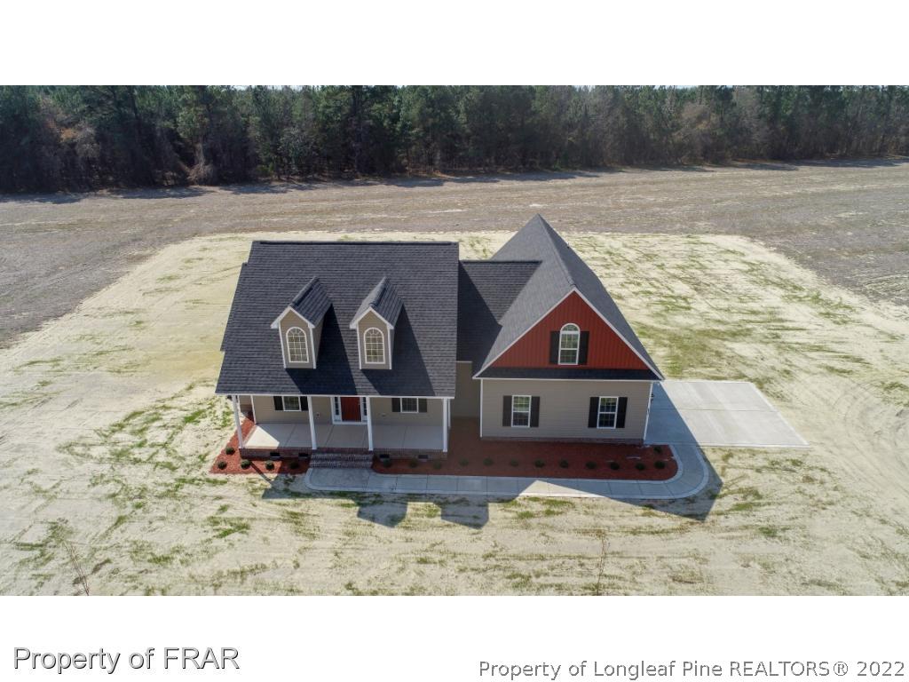 5615 Wade-Stedman Road Wade, NC 28395 - Photo 33 of 36 a aerial view of a house with a yard