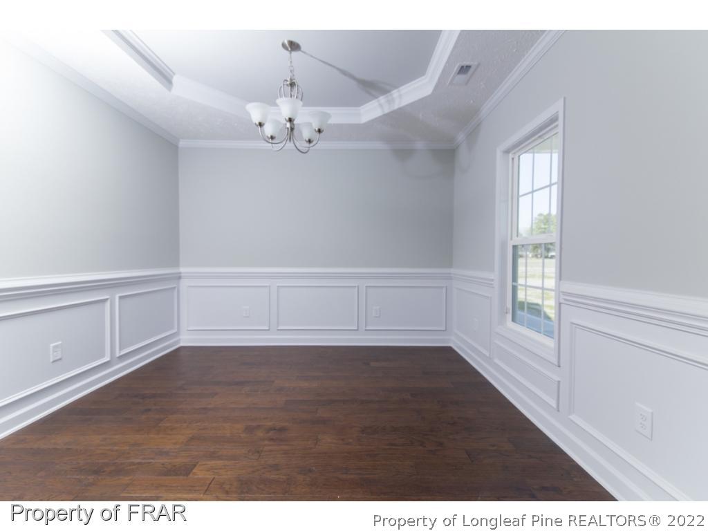 5615 Wade-Stedman Road Wade, NC 28395 - Photo 5 of 36 a view of an empty room with a window