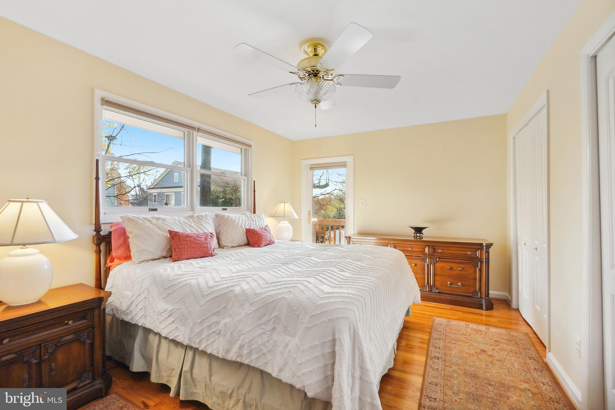 9127 Kirkdale Road Bethesda, MD 20817 - Photo 15 of 34 a bed room with a bed and a chandelier