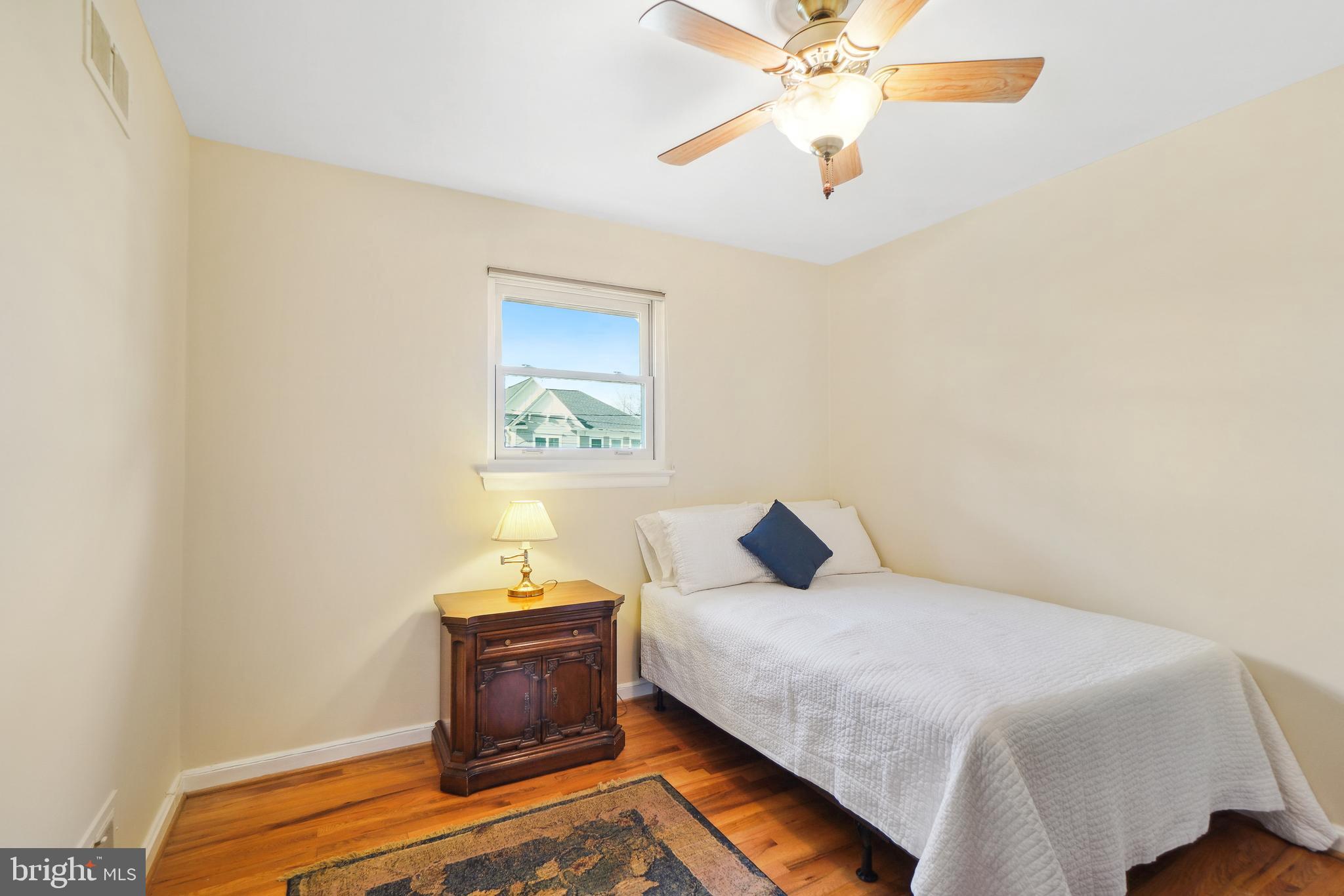 9127 Kirkdale Road Bethesda, MD 20817 - Photo 20 of 34 a bedroom with a bed and a window