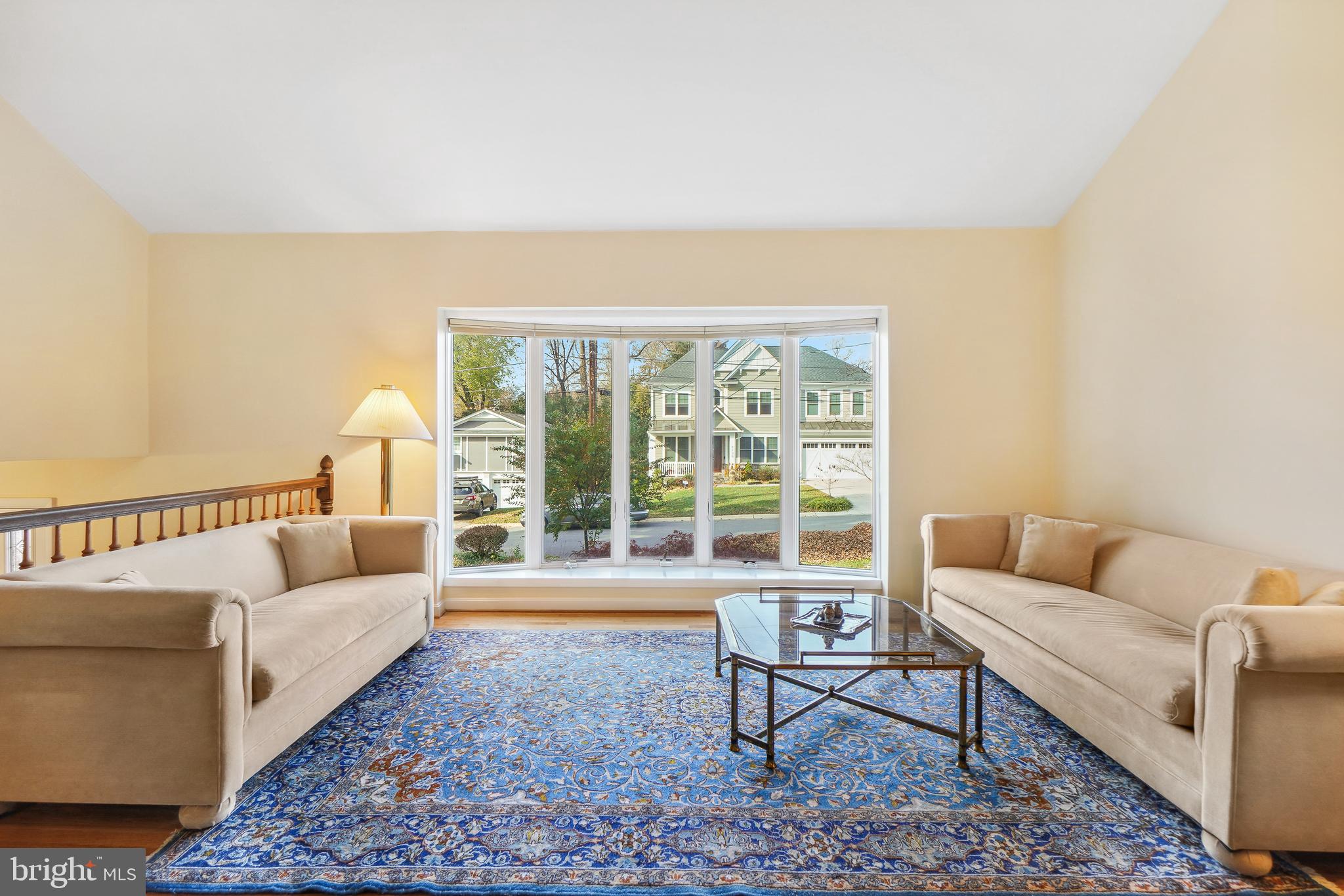 9127 Kirkdale Road Bethesda, MD 20817 - Photo 2 of 34 a living room with furniture and a large window