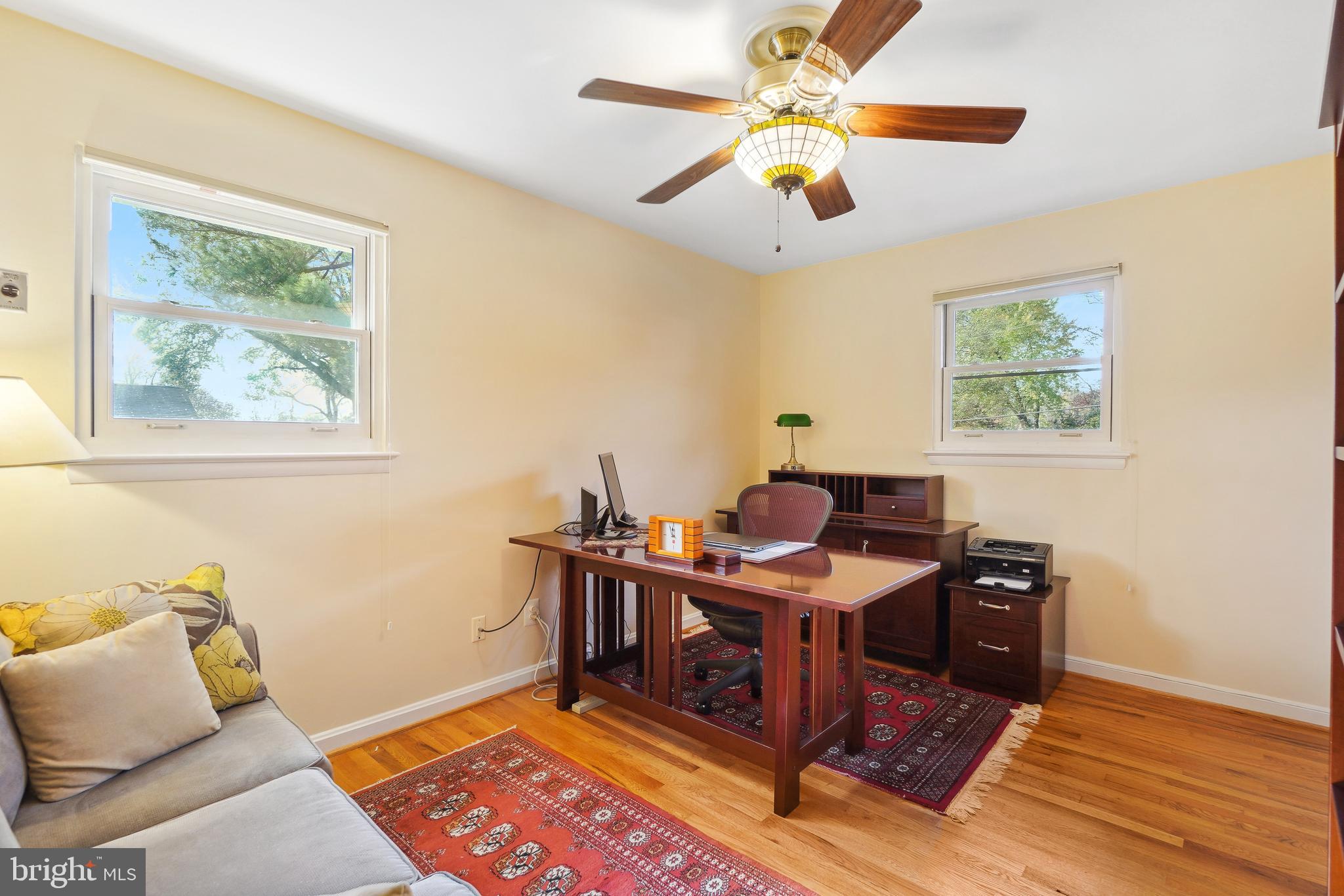 9127 Kirkdale Road Bethesda, MD 20817 - Photo 23 of 34 a view of a workspace with furniture and a window