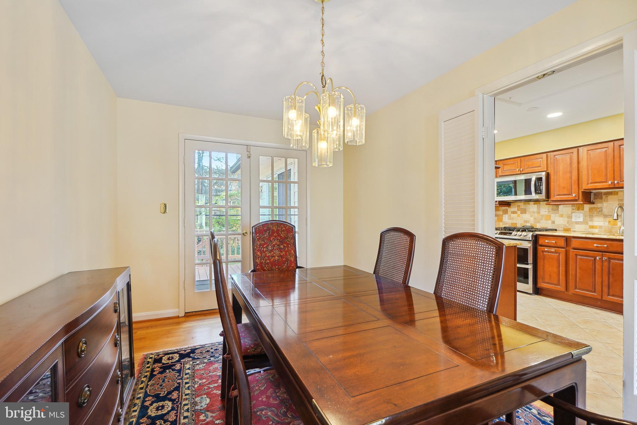 9127 Kirkdale Road Bethesda, MD 20817 - Photo 8 of 34 a dining room with furniture and window