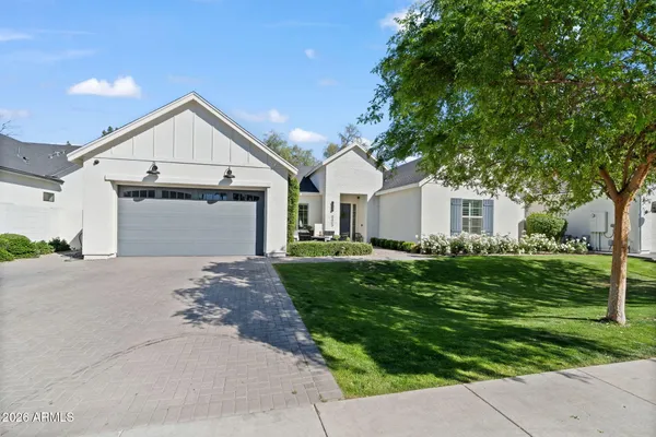 front view of a house with a yard