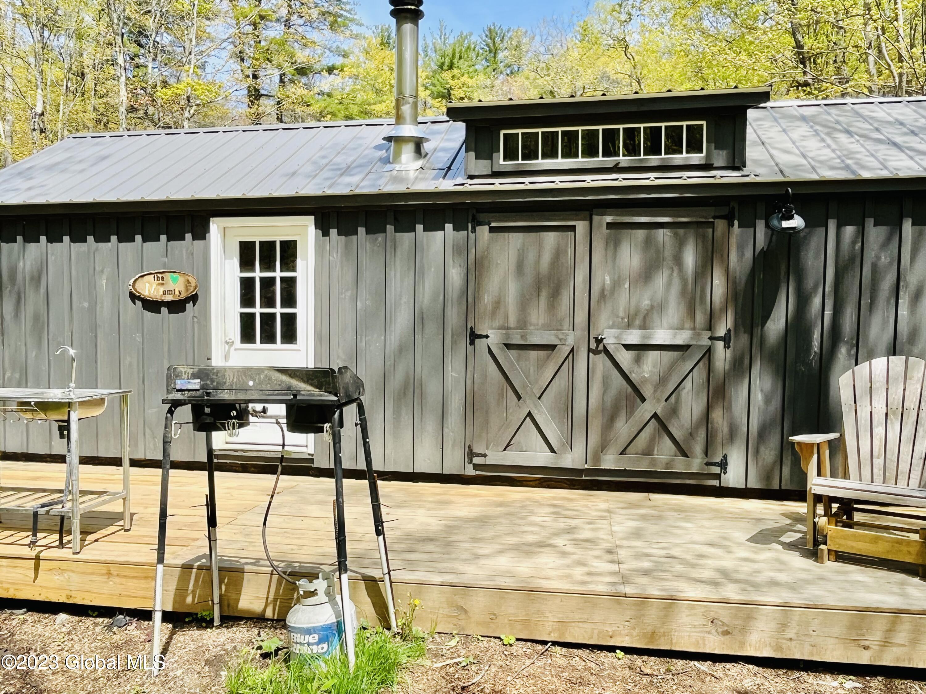 168 Middle Road Austerlitz, NY 12017 - Photo 3 of 29 front of cabin