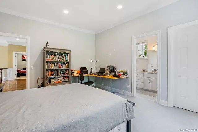 a bed room with a bed and dresser