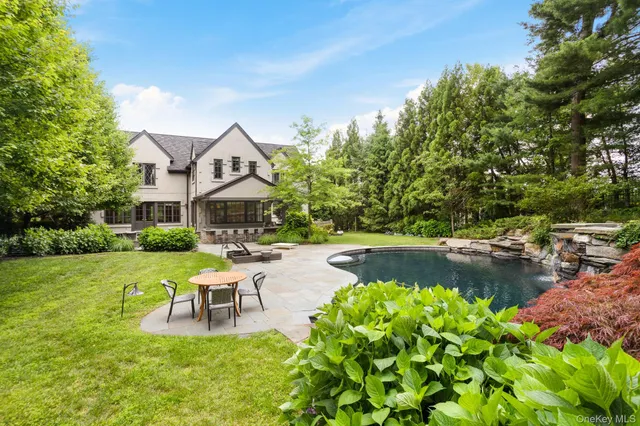 a house with garden in front of it