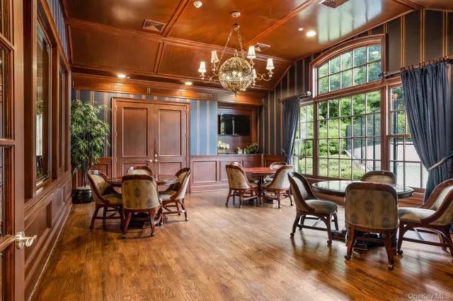a view of a dining room with furniture window and outside view