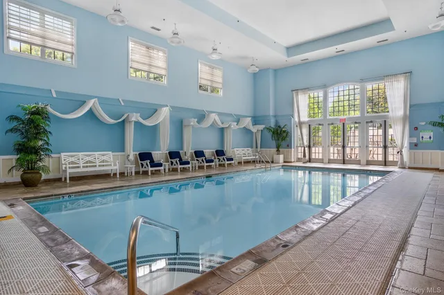 a view of a kitchen counter top space with wooden floor