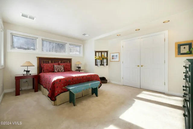 a bathroom with a mirror and a sink
