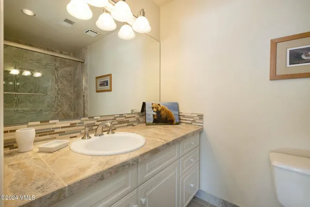 a view of a backyard of the house