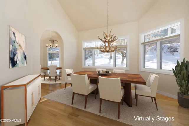 a living room with furniture a couch and a fireplace