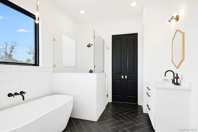 a bathroom with a sink and a bathtub