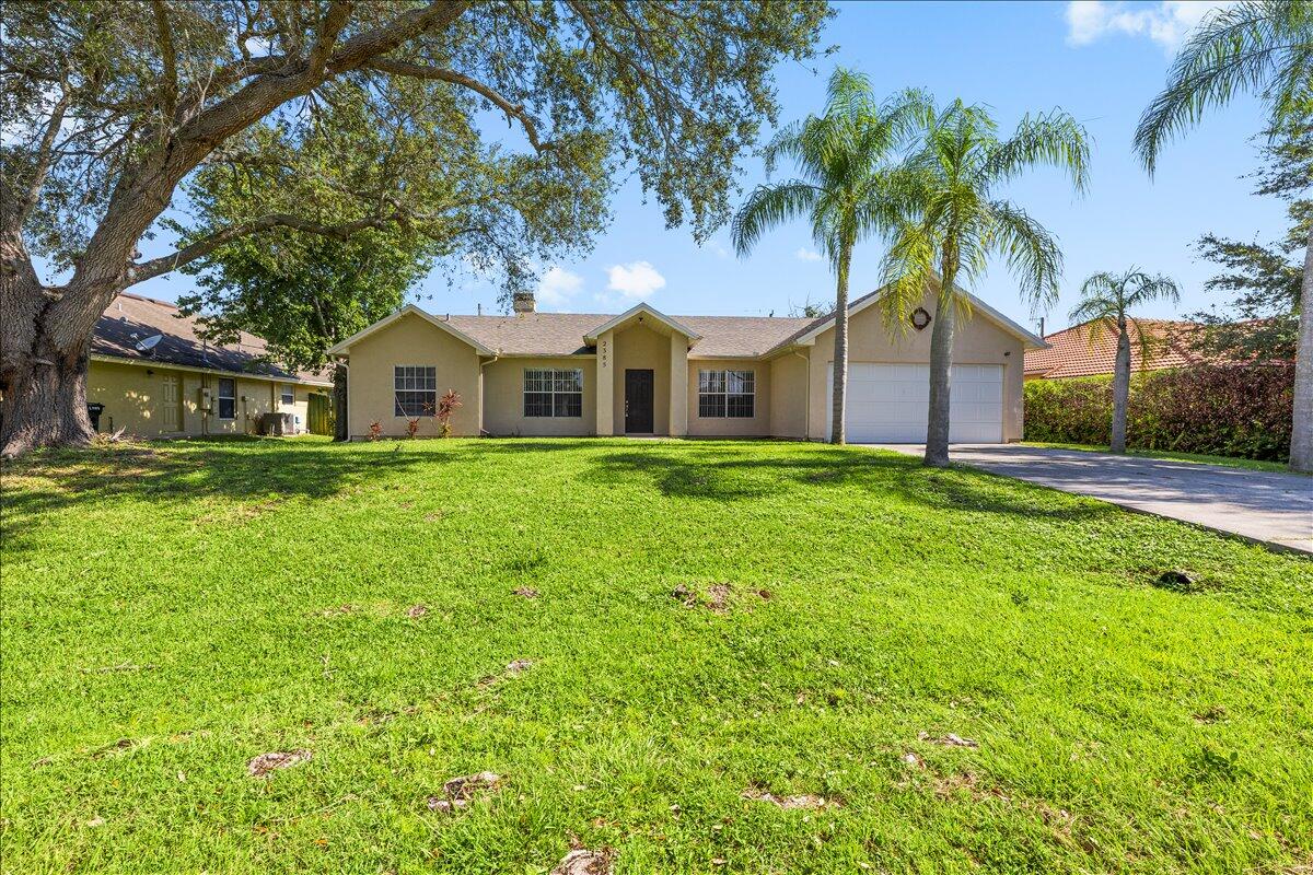 2385 Southwest Neal Road Port St. Lucie, FL 34953 - Photo 1 of 38 01-424A1280