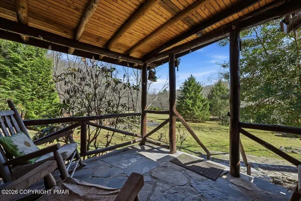 a view of a tables and chairs on the patio